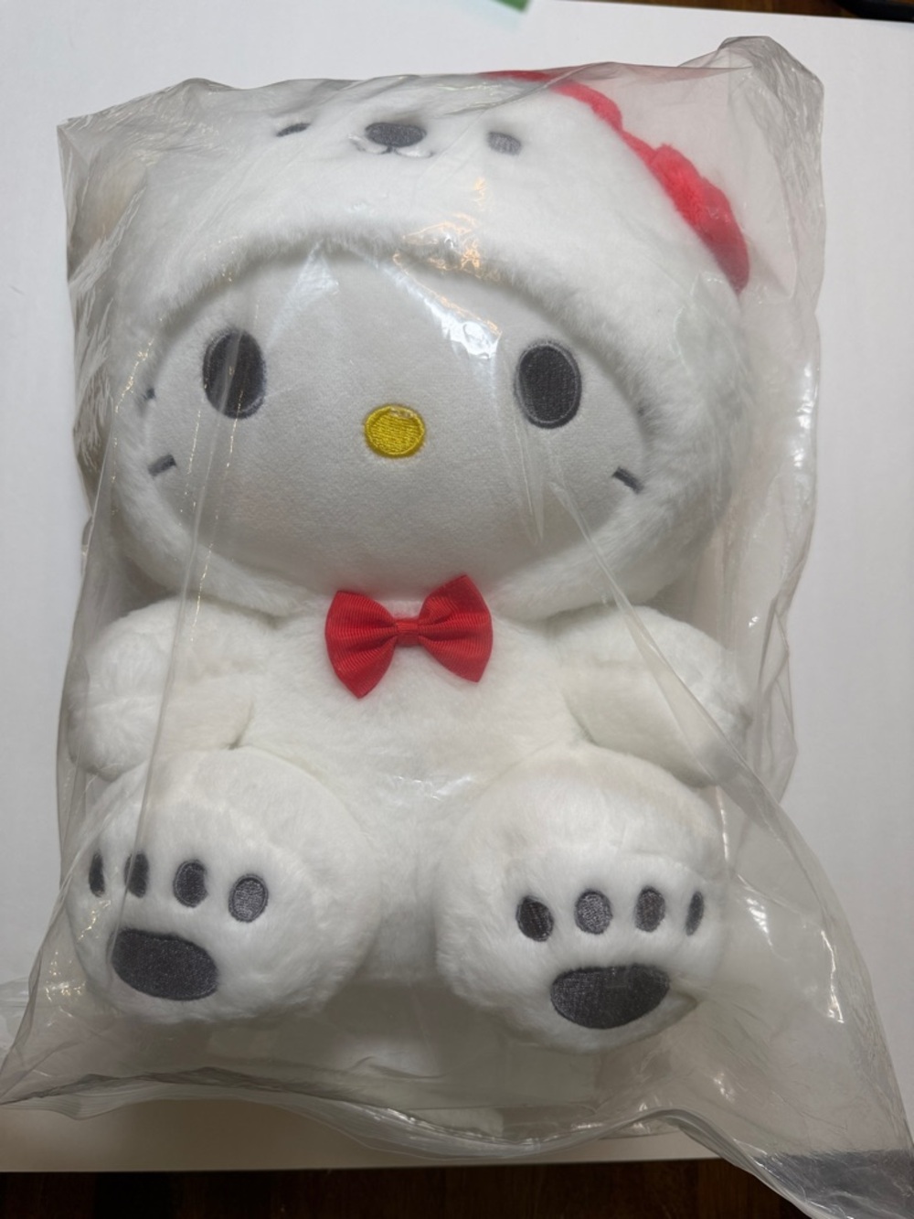 Cute cat plush with bear costume